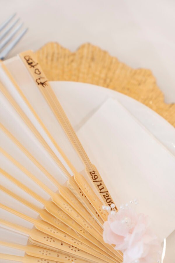 Engraved folding fan