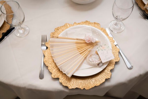 Engraved folding fan